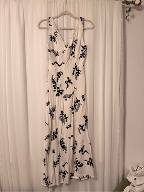 Sleeveless White Maxi Dress with Black Botanical Motif